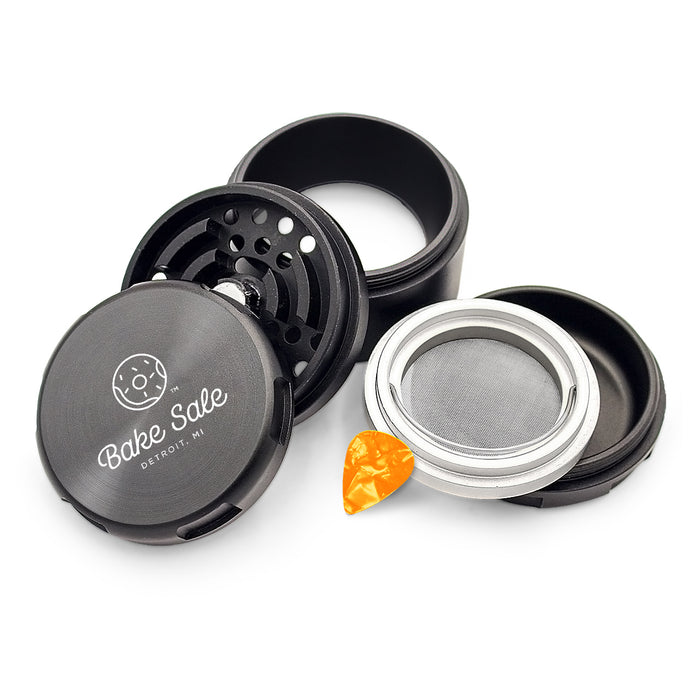 Bake Sale - Aircraft Grade Aluminum Grinder - W/ Guitar Pick & Removable Magnetic Screen - "75 Frosted" - 5-Piece - 75mm Wide - 2.5" Tall - Bake Sale Logo Design